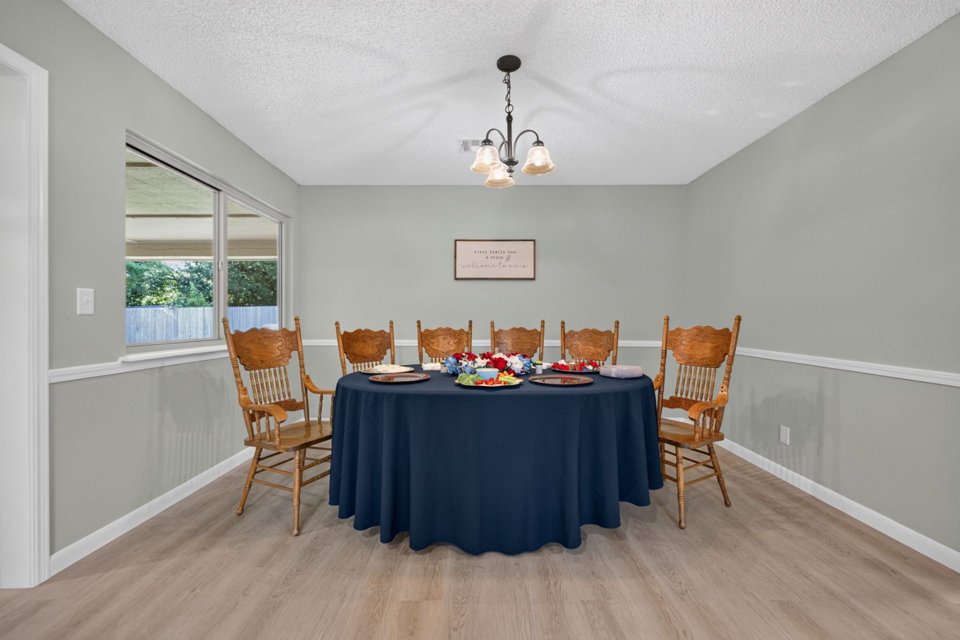 The dining room at Aspen, set with a round table and seating for shared meals